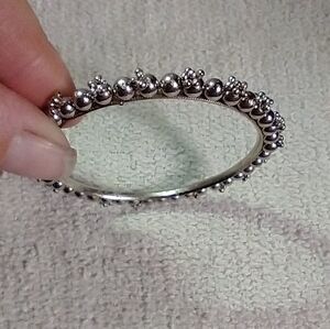 Silvertone decorative bangle bracelet